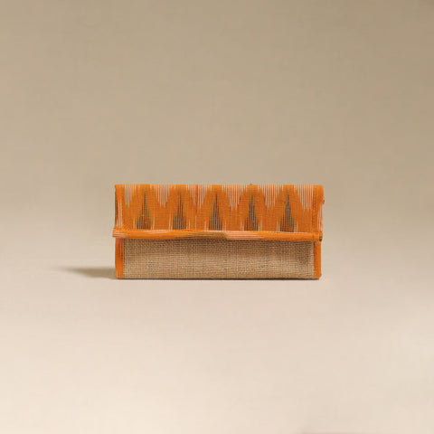 Orange - handcrafted ikat fabric jute clutch / wallet