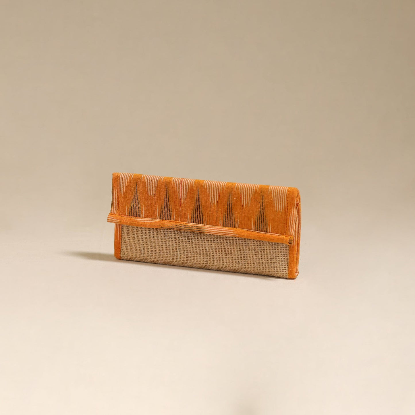 Orange - handcrafted ikat fabric jute clutch / wallet