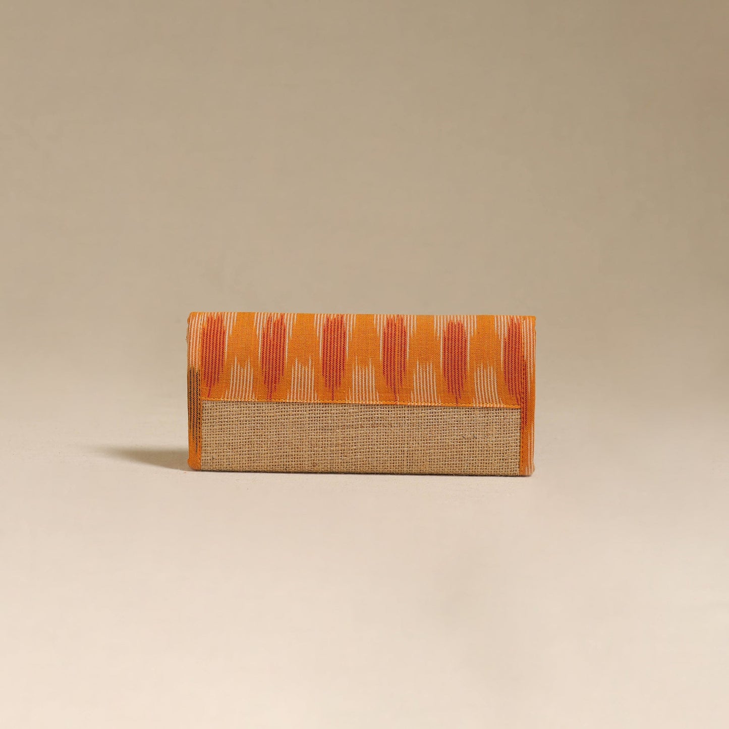 Orange - handcrafted ikat fabric jute clutch / wallet