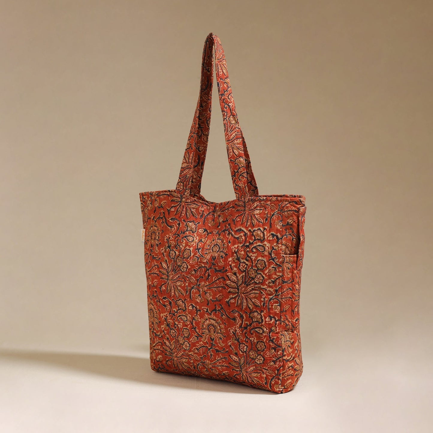 Handcrafted quilted kalamkari block printed fabric tote bag