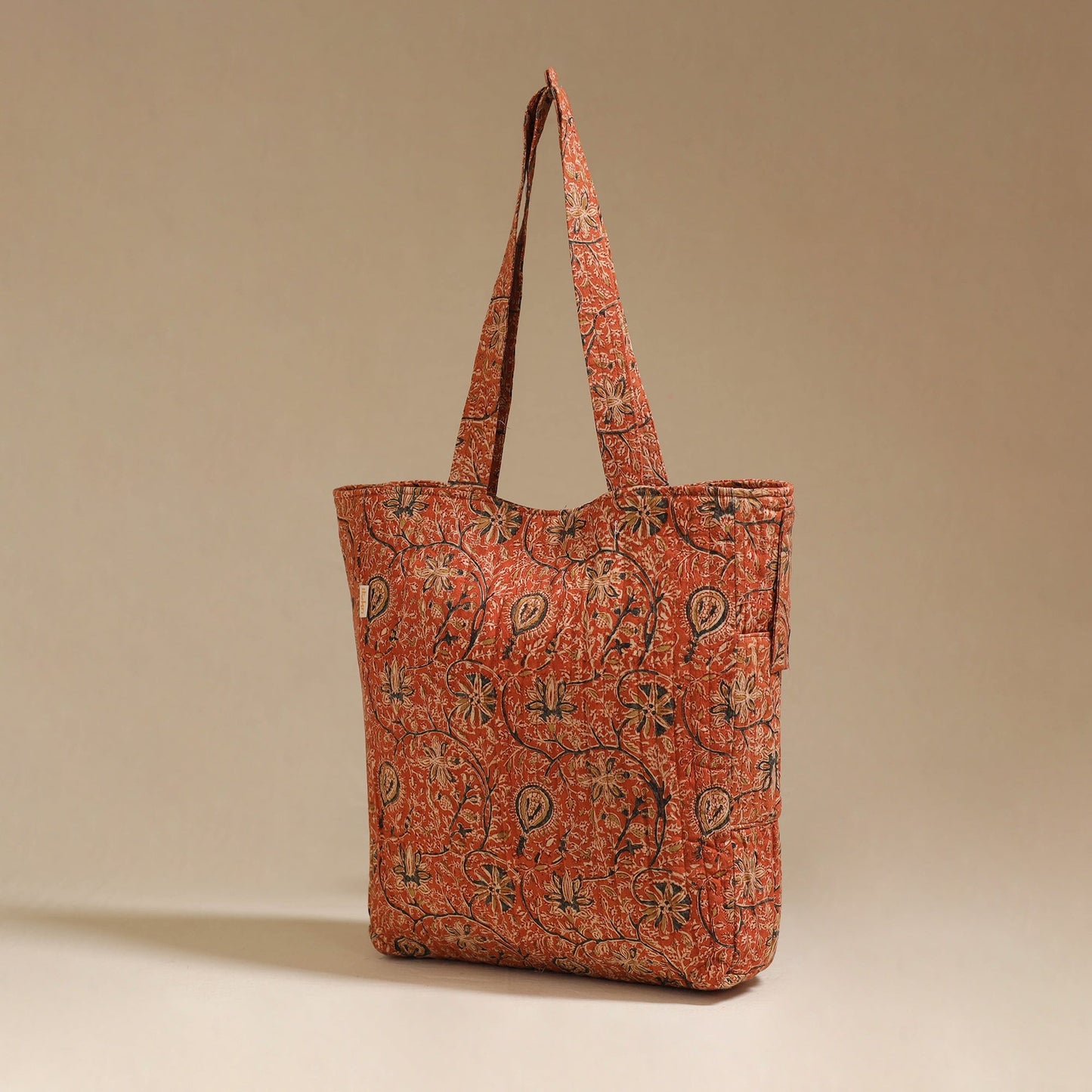 Handcrafted quilted kalamkari block printed fabric tote bag