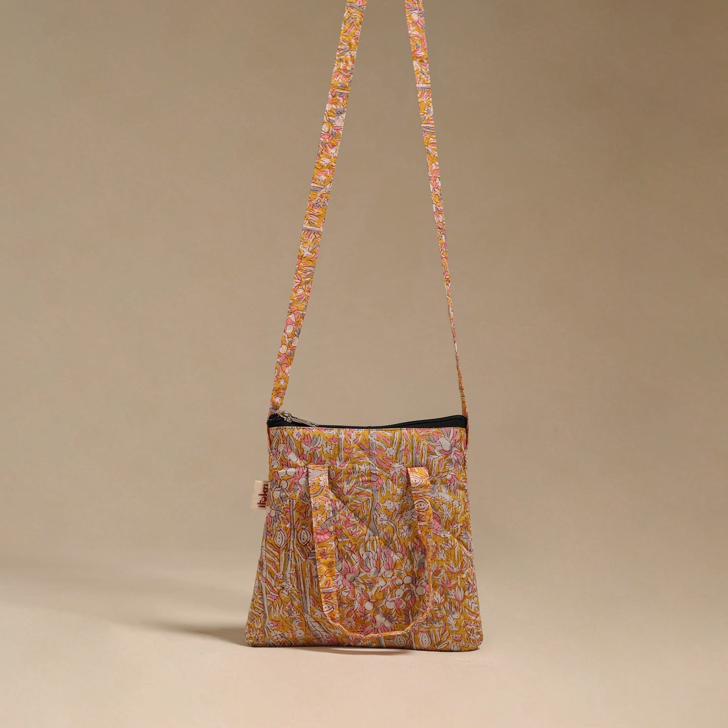 Handcrafted quilted sling bag 02
