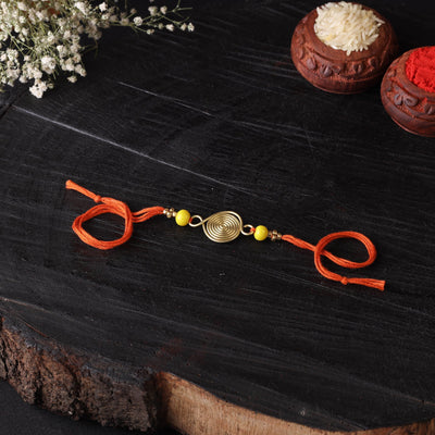 Handcrafted tribal dokra brass thread rakhi 12