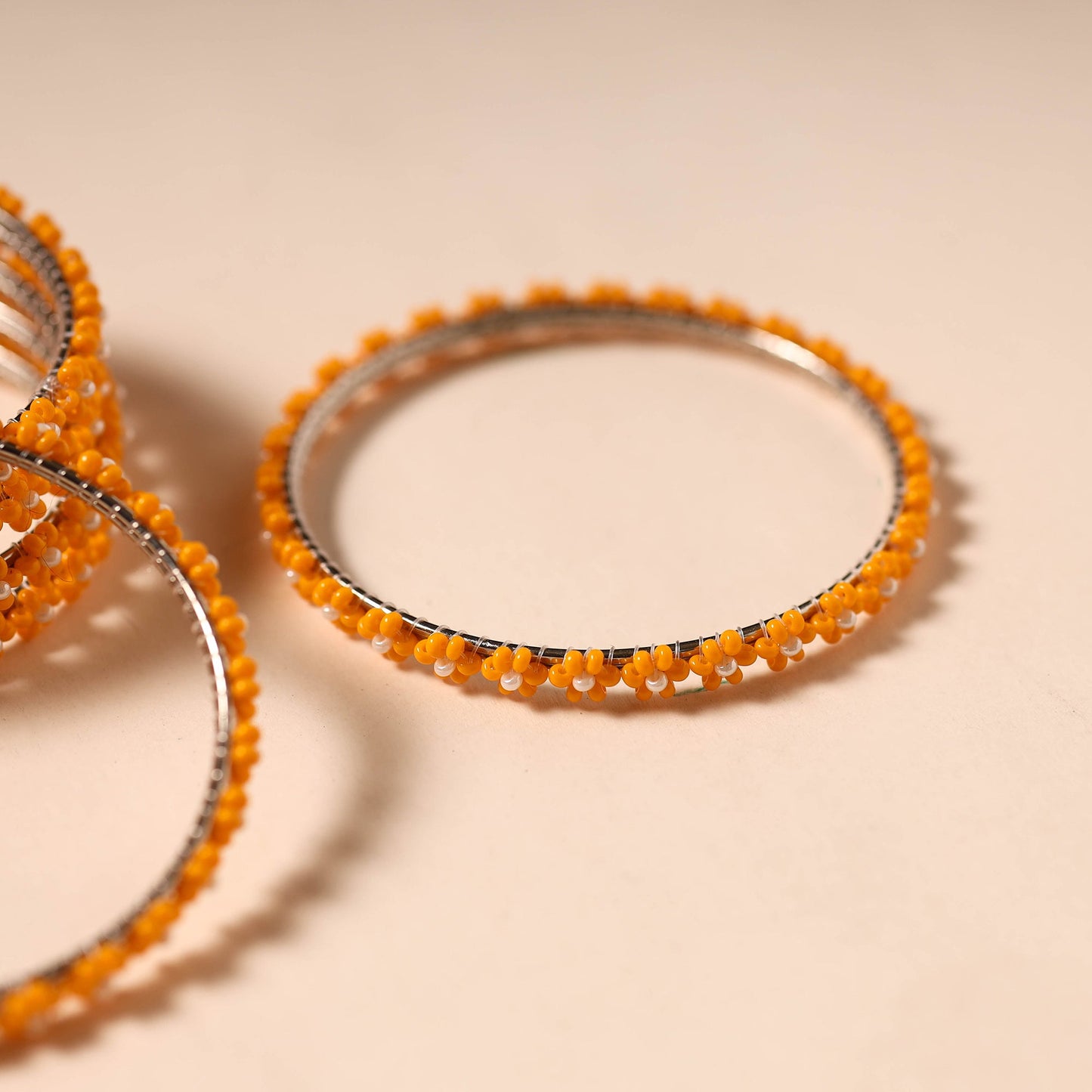 Orange - hapur flower beadwork bangles by aagaz (set of 6)