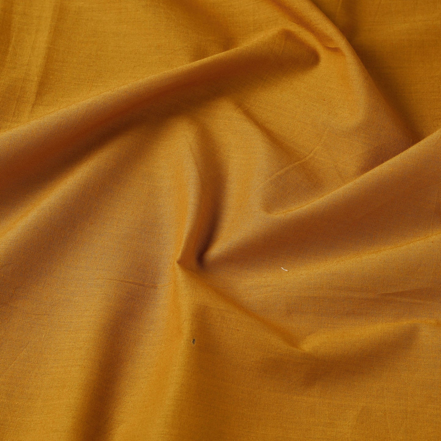Buy Orange Prewashed Plain Cotton Fabric