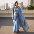 Blue Organic Kala Cotton Bhujodi Handloom Saree, draped and worn by a woman, AI visual of the saree, iTokri