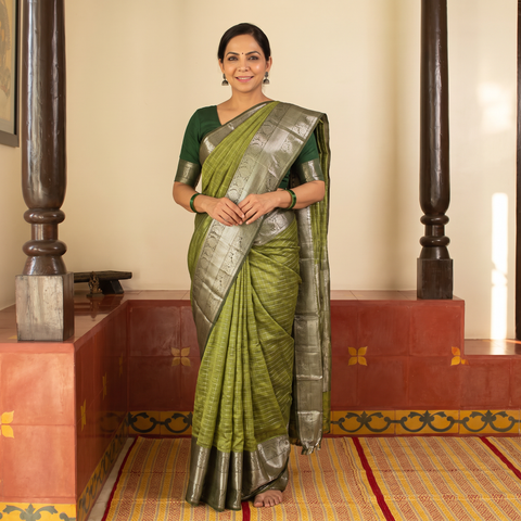Green Original Handloom Silk Cotton Mangalagiri Saree, draped and worn by a woman, AI visual of the saree, iTokri