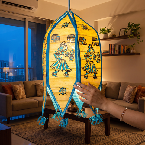 Pattachitra Handpainted Palm Leaf Lampshade from Odisha, lit in a home in the evening, AI visual of the light, iTokri