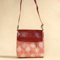  Handcrafted Ikat Fabric Sling Bag with Embossed Leather Flap 