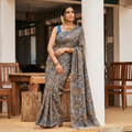 Green Pedana Hand Block Print Natural Dyed Cotton Kalamkari Saree, draped and worn by a woman, AI visual of the saree, iTokri