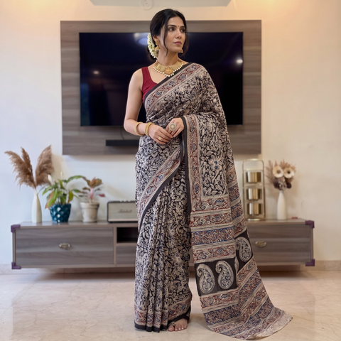 Black Pedana Hand Block Print Natural Dyed Cotton Kalamkari Saree, draped and worn by a woman, AI visual of the saree, iTokri