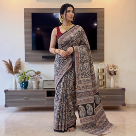 Black Pedana Hand Block Print Natural Dyed Cotton Kalamkari Saree, draped and worn by a woman, AI visual of the saree, iTokri