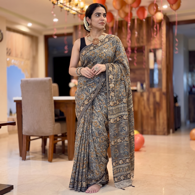 Brown Pedana Hand Block Print Natural Dyed Cotton Kalamkari Saree, draped and worn by a woman, AI visual of the saree, iTokri