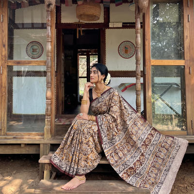 Maroon Pedana Hand Block Print Natural Dyed Cotton Kalamkari Saree, draped and worn by a woman, AI visual of the saree, iTokri