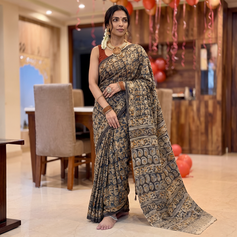 Green Pedana Hand Block Print Natural Dyed Cotton Kalamkari Saree, draped and worn by a woman, AI visual of the saree, iTokri