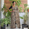 Green Pedana Hand Block Print Natural Dyed Cotton Kalamkari Saree, draped and worn by a woman, AI visual of the saree, iTokri