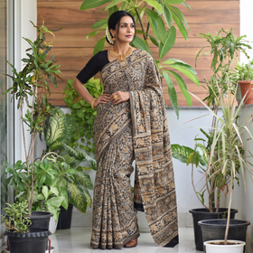 Green Pedana Hand Block Print Natural Dyed Cotton Kalamkari Saree, draped and worn by a woman, AI visual of the saree, iTokri
