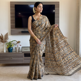 Green Pedana Hand Block Print Natural Dyed Cotton Kalamkari Saree, draped and worn by a woman, AI visual of the saree, iTokri