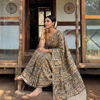 Green Pedana Hand Block Print Natural Dyed Cotton Kalamkari Saree, draped and worn by a woman, AI visual of the saree, iTokri