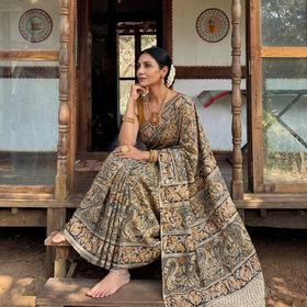 Green Pedana Hand Block Print Natural Dyed Cotton Kalamkari Saree, draped and worn by a woman, AI visual of the saree, iTokri