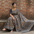 Green Pedana Hand Block Print Natural Dyed Cotton Kalamkari Saree, draped and worn by a woman, AI visual of the saree, iTokri