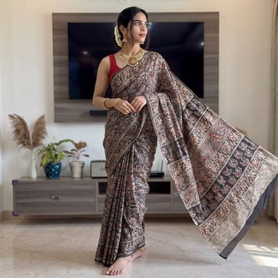 Multicolor Pedana Hand Block Print Natural Dyed Cotton Kalamkari Saree, draped and worn by a woman, AI visual of the saree, iTokri