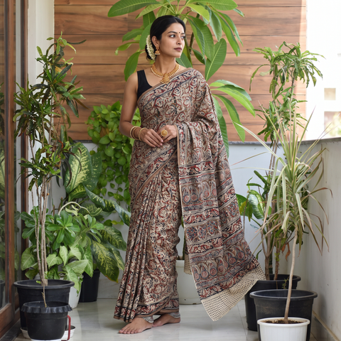 Brown Pedana Hand Block Print Natural Dyed Cotton Kalamkari Saree, draped and worn by a woman, AI visual of the saree, iTokri