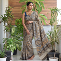 Green Pedana Hand Block Print Natural Dyed Cotton Kalamkari Saree, draped and worn by a woman, AI visual of the saree, iTokri