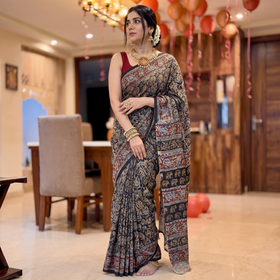 Black Pedana Hand Block Print Natural Dyed Cotton Kalamkari Saree, draped and worn by a woman, AI visual of the saree, iTokri