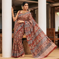 Red Pedana Hand Block Print Natural Dyed Cotton Kalamkari Saree, draped and worn by a woman, AI visual of the saree, iTokri