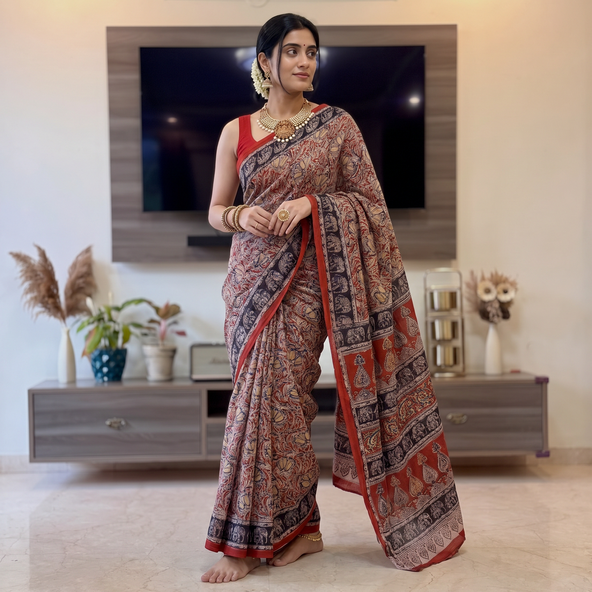 Red Pedana Hand Block Print Natural Dyed Cotton Kalamkari Saree, draped and worn by a woman, AI visual of the saree, iTokri