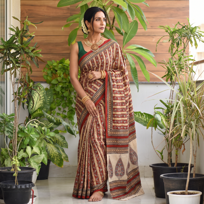 Red Pedana Hand Block Print Natural Dyed Cotton Kalamkari Saree, draped and worn by a woman, AI visual of the saree, iTokri