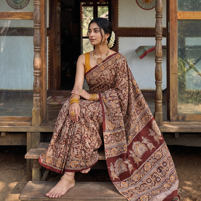 Maroon Pedana Hand Block Print Natural Dyed Cotton Kalamkari Saree, draped and worn by a woman, AI visual of the saree, iTokri