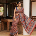 Red Pedana Hand Block Print Natural Dyed Cotton Kalamkari Saree, draped and worn by a woman, AI visual of the saree, iTokri