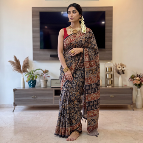 Black Pedana Hand Block Print Natural Dyed Cotton Kalamkari Saree, draped and worn by a woman, AI visual of the saree, iTokri