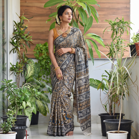 Multicolor Pedana Hand Block Print Natural Dyed Cotton Kalamkari Saree, draped and worn by a woman, AI visual of the saree, iTokri