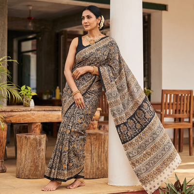 Black Pedana Hand Block Print Natural Dyed Cotton Kalamkari Saree, draped and worn by a woman, AI visual of the saree, iTokri