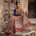 Red Pedana Hand Block Print Natural Dyed Cotton Kalamkari Saree, draped and worn by a woman, AI visual of the saree, iTokri