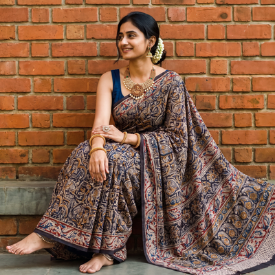 Multicolor Pedana Hand Block Print Natural Dyed Cotton Kalamkari Saree, draped and worn by a woman, AI visual of the saree, iTokri