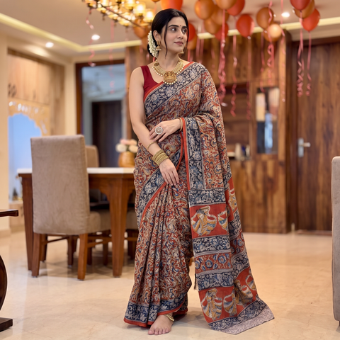Red Pedana Hand Block Print Natural Dyed Cotton Kalamkari Saree, draped and worn by a woman, AI visual of the saree, iTokri