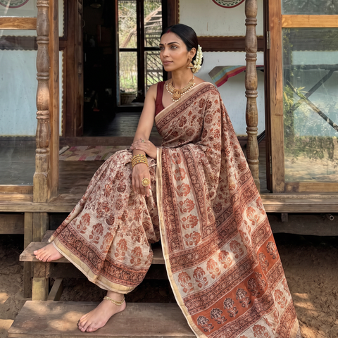 Orange Pedana Hand Block Print Natural Dyed Kota Doria Cotton Kalamkari Saree, draped and worn by a woman, AI visual of the saree, iTokri