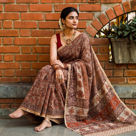Orange Pedana Hand Block Print Natural Dyed Kota Doria Cotton Kalamkari Saree, draped and worn by a woman, AI visual of the saree, iTokri