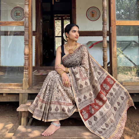 Beige Pedana Hand Block Print Natural Dyed Kota Doria Cotton Kalamkari Saree, draped and worn by a woman, AI visual of the saree, iTokri