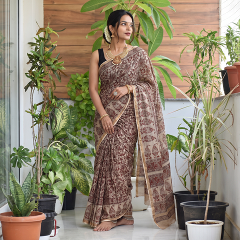 Beige Pedana Hand Block Print Natural Dyed Kota Doria Cotton Kalamkari Saree, draped and worn by a woman, AI visual of the saree, iTokri