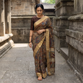 Brown Penwork Tussar Ghicha Silk Handspun Handpainted Srikalahasti Kalamkari Saree, draped and worn by a woman, AI visual of the saree, iTokri