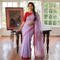 Purple Phulia Jamdani Pure Handloom Cotton Saree with Tassels (Count 84/40), draped and worn by a woman, AI visual of the saree, iTokri