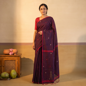 Maroon Phulia Jamdani Pure Handloom Cotton Saree with Tassels (Count 92/40), draped and worn by a woman, AI visual of the saree, iTokri