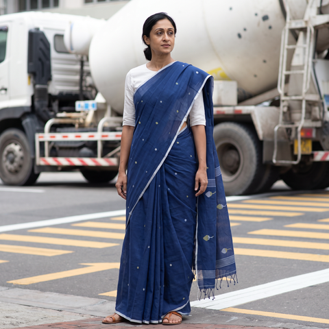 Blue Phulia Jamdani Pure Handloom Cotton Saree with Tassels (Count 92/40), draped and worn by a woman, AI visual of the saree, iTokri
