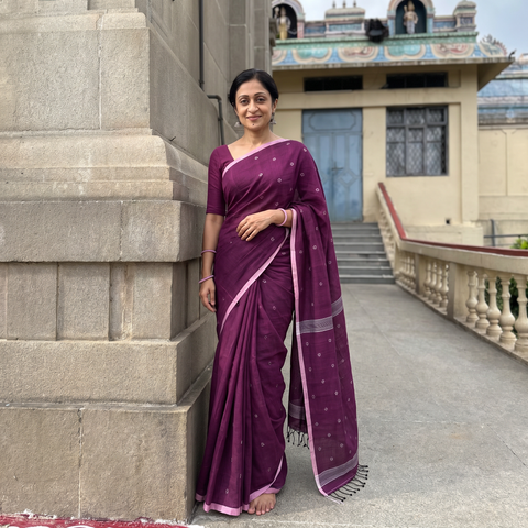 Purple Phulia Jamdani Pure Handloom Cotton Saree with Tassels (Count 92/40), draped and worn by a woman, AI visual of the saree, iTokri