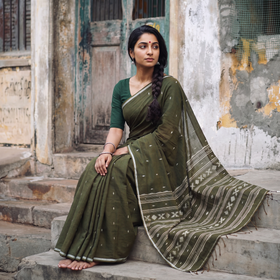 Green Phulia Jamdani Pure Handloom Cotton Saree with Tassels (Count 92/40), draped and worn by a woman, AI visual of the saree, iTokri